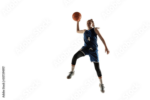 Young caucasian female basketball player of team in action, motion in jump isolated on white background. Concept of sport, movement, energy and dynamic, healthy lifestyle. Training, practicing. © master1305