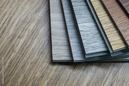 PVC Polymer Vinyl sample for customers to choose the floor design within the copy space .