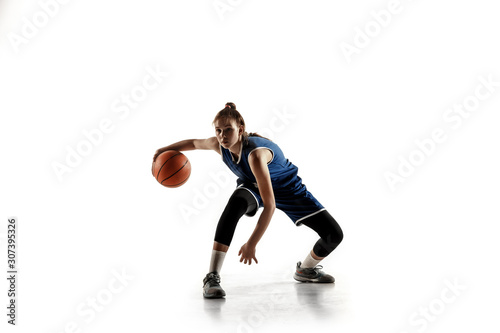 Young caucasian female basketball player of team in action, motion in run isolated on white background. Concept of sport, movement, energy and dynamic, healthy lifestyle. Training, practicing. © master1305