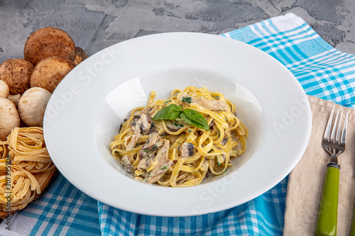 Top down view of Creamy Mushroom Fettucini Alfredo pasta. photo