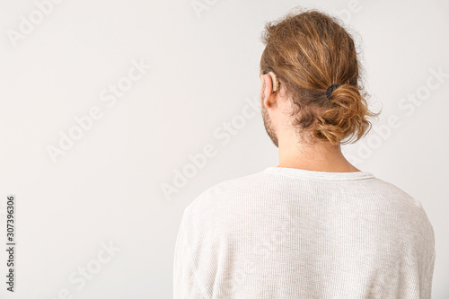 Young man with hearing aid ...