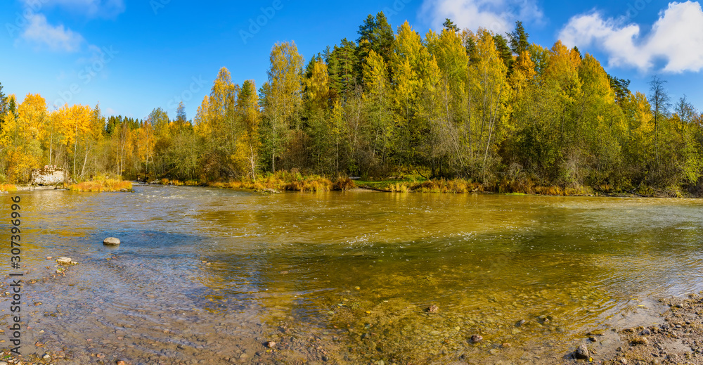 Autumn landscape in Karelia with a river. Autumn landscape in Karelia with a river.