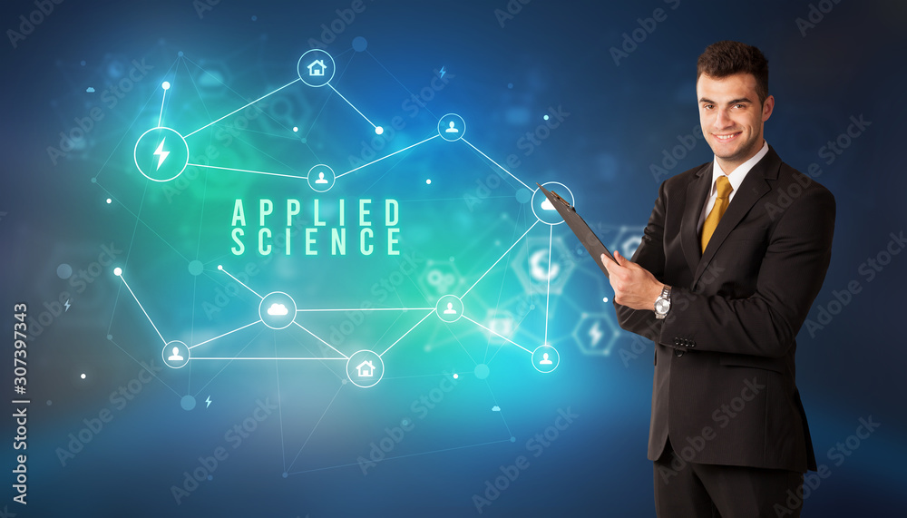 Businessman in front of cloud service icons with APPLIED SCIENCE inscription, modern technology concept Businessman in front of cloud service icons with APPLIED SCIENCE inscription, modern technology concept