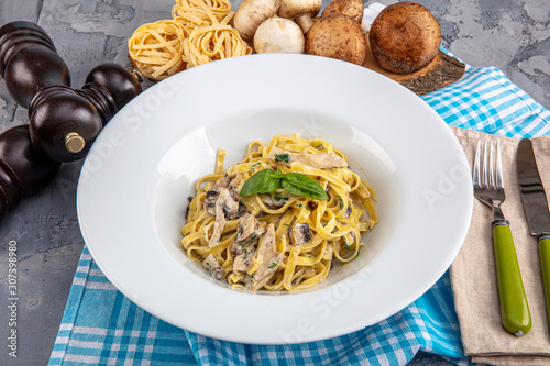 Top down view of Creamy Mushroom Fettucini Alfredo pasta. photo