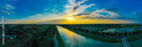 Aerial view of Surreal landscape Khlong Prapa, water storage and delivery raw  water,water supply The canal piped through the community and many buildings. To send water to water production plants. photo