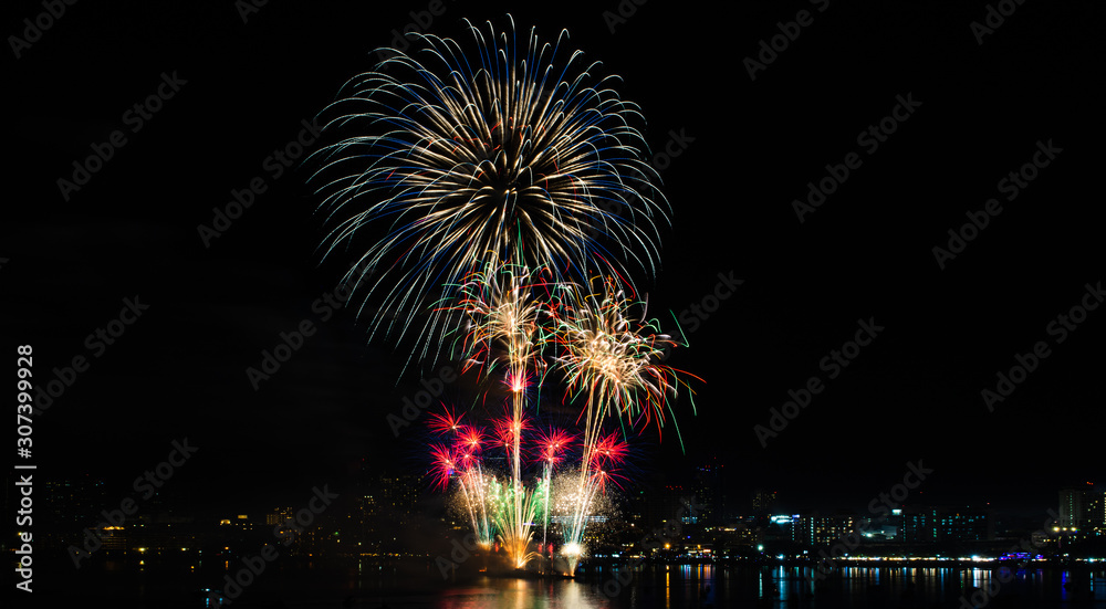 Beautiful fireworks against the background as over city scape view of night city in Thailand. Beautiful fireworks against the background as over city scape view of night city in Thailand.