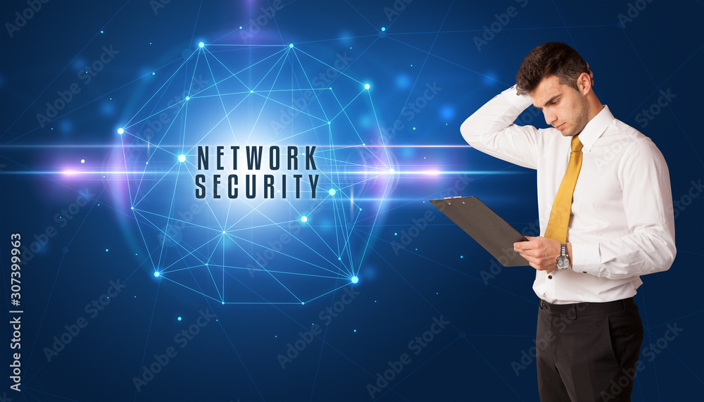 Businessman thinking about security solutions with NETWORK SECURITY inscription
