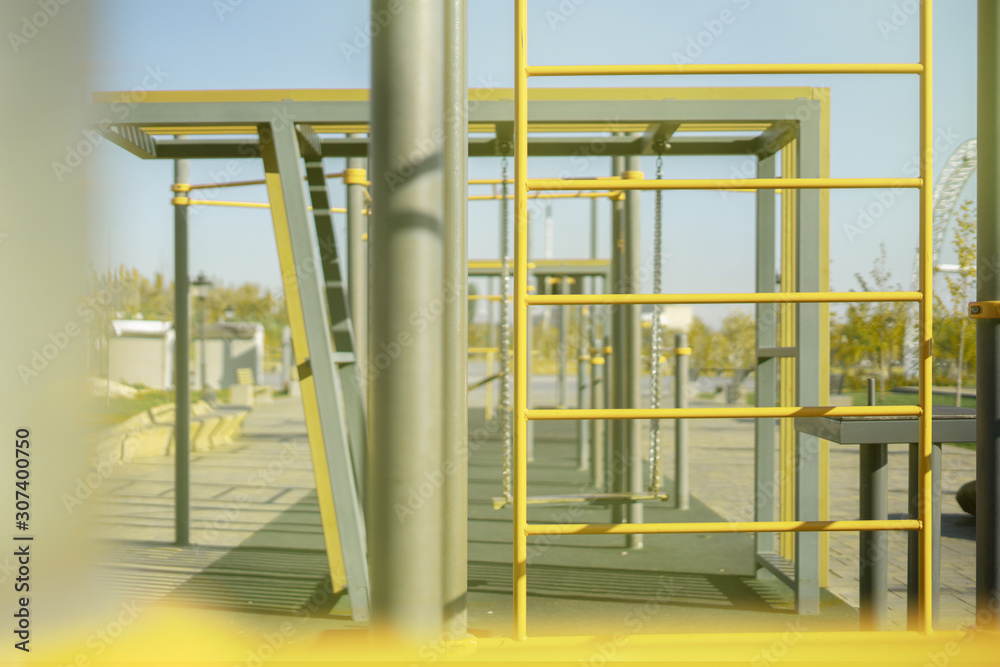 public city orange vertical and horizontal bars for healthy sport exercise in the morning public city orange vertical and horizontal bars for healthy sport exercise in the morning