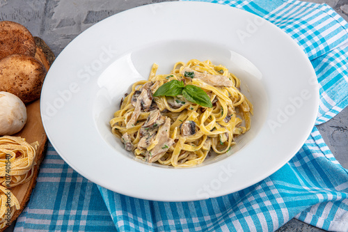 Top down view of Creamy Mushroom Fettucini Alfredo pasta. photo