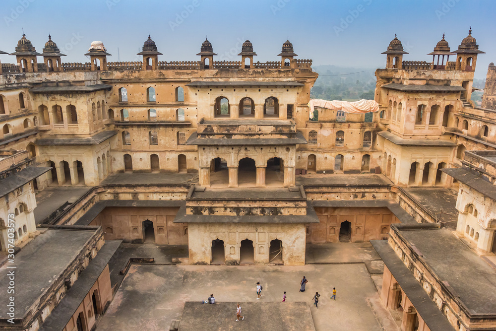 Facade with small towers of the fort in Orchha, India
