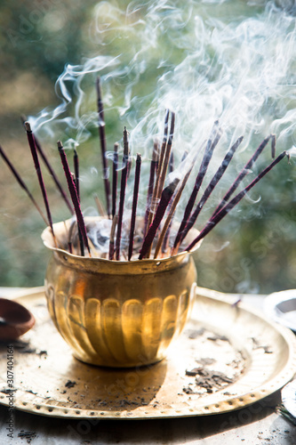 Incense stick. Burning aromatic incense sticks. Incense for praying Hindu gods to show respect.