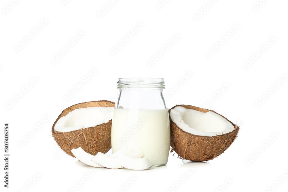 Bottle of milk, coconut and slice coconut isolated on white background Bottle of milk, coconut and slice coconut isolated on white background