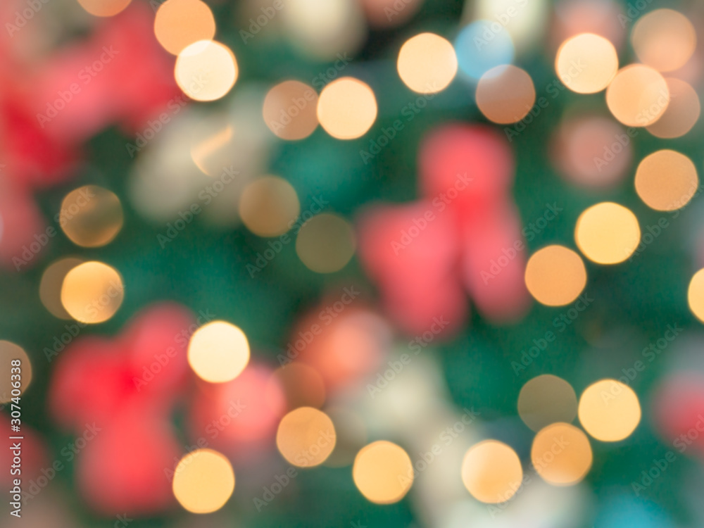 Abstract blurred golden Christmas light on tree with other ornaments. Christmas and New Year holidays concept. Abstract blurred golden Christmas light on tree with other ornaments. Christmas and New Year holidays concept.