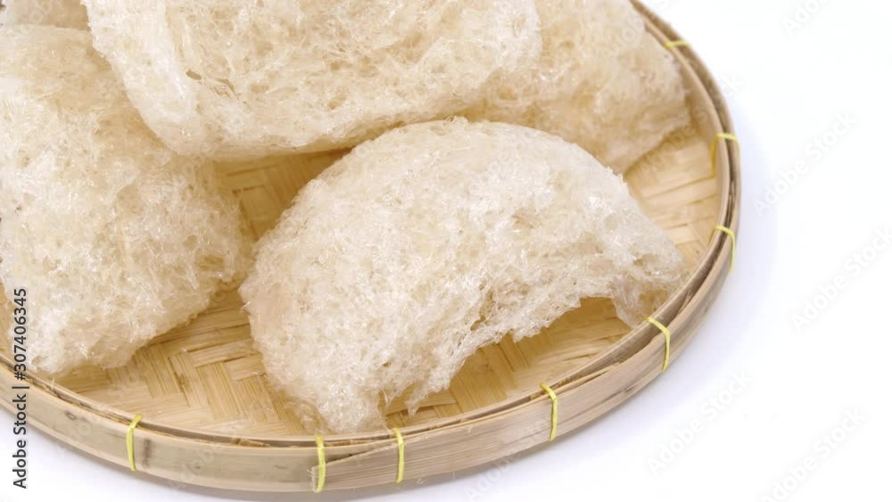 Raw Bird's nest (Edible Nest Swiftlet) on white background, Edible nest soup food chinese medicine. Raw Bird's nest (Edible Nest Swiftlet) on white background, Edible nest soup food chinese medicine.
