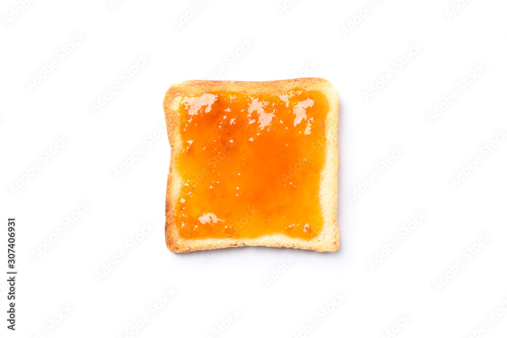 Toast with apricot jam isolated on white background