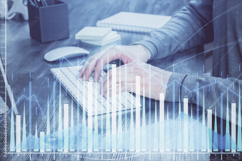 Double exposure of man's hands writing notes of stock market with forex chart. Double exposure of man's hands writing notes of stock market with forex chart.