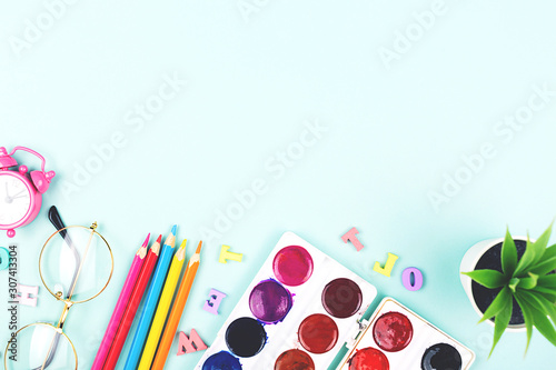 School or office supplies on a desk with copy space. Creative flatlay. Top view.