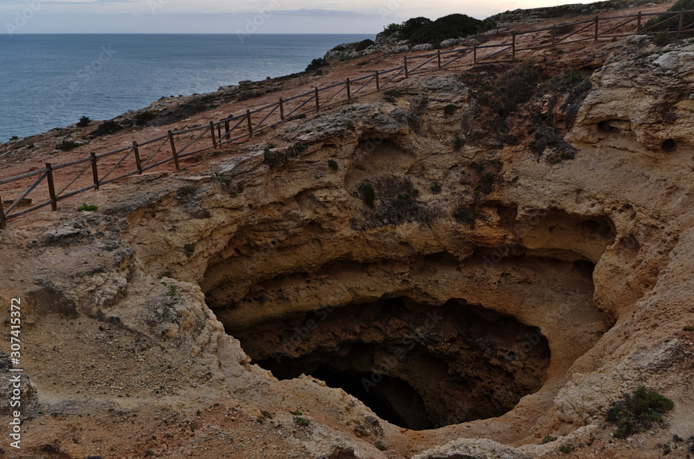Erosion effect on sedimentary rocks in the Seven Hanging Valleys trail. Lagoa, Algarve, Portugal