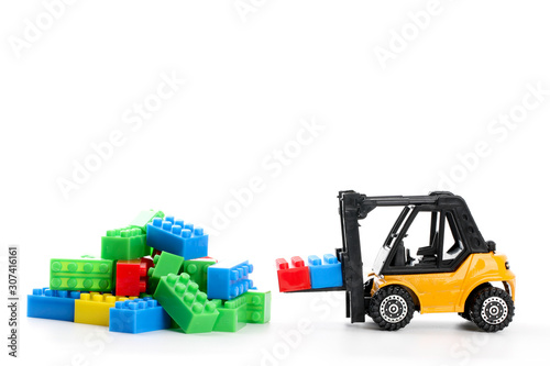 Plastic toy block over white background