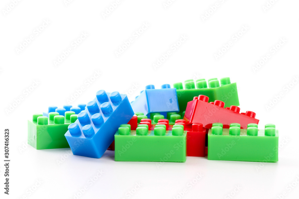 Plastic toy block over white background Plastic toy block over white background