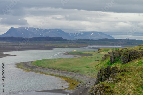 Island. mountain river flowing down from the glacier. Journey around the island. The Landscape Of Iceland. Tourism.