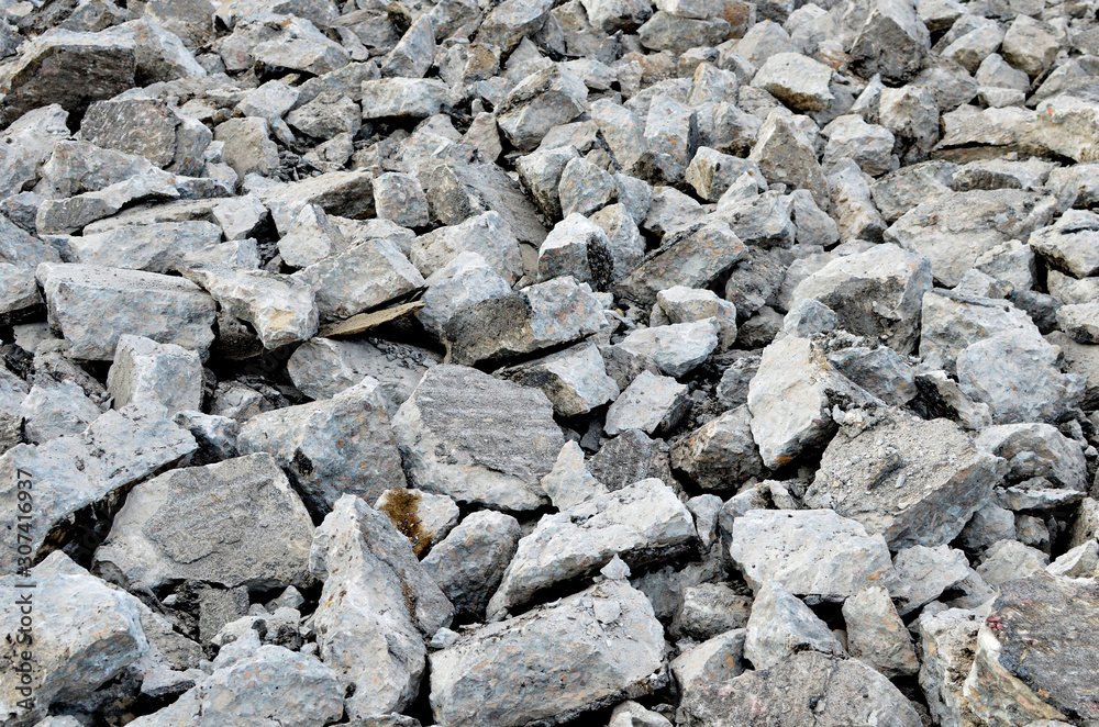 Hardcore waste recycling. Broken concrete slabs at construction site. oncrete rubble from demolition at landfill. Recycling and reuse crushed concrete rubble, asphalt, building material, blocks. Hardcore waste recycling. Broken concrete slabs at construction site. oncrete rubble from demolition at landfill. Recycling and reuse crushed concrete rubble, asphalt, building material, blocks.