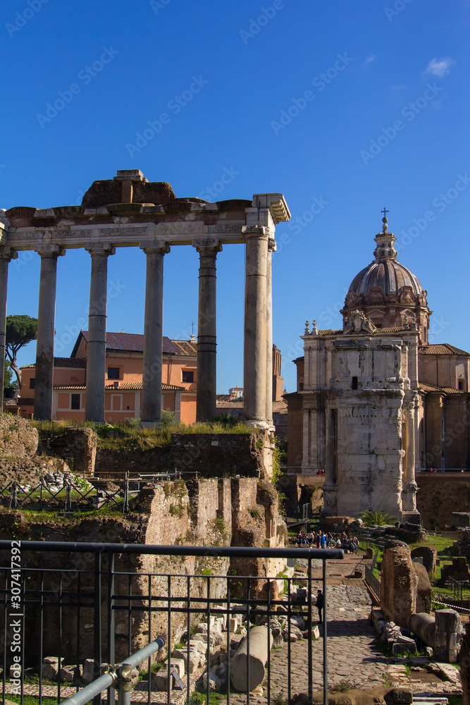 background view of ancient palace and antique ruins in the Roman Forum on Capitol Hill, Rome, Europe