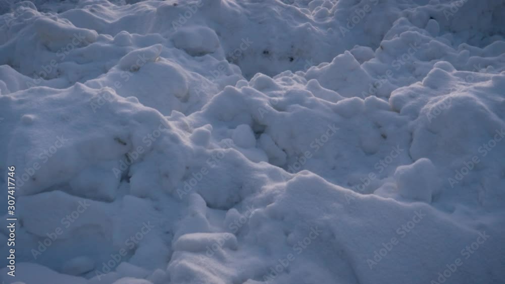 A closeup view of heavy snow collected after a heavy snowfall during extreme winters of Saguenay, Chicoutimi, Quebec, Canada.