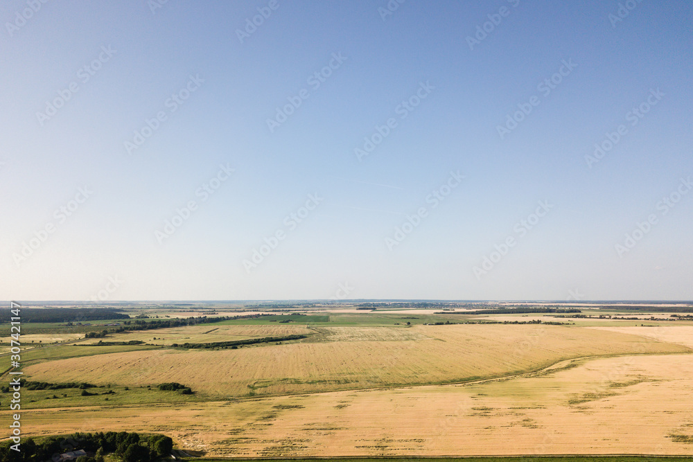 Fototapeta premium Bird Eye View of the Fields and Agricultural Parcel. Aerial Views.