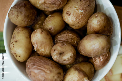 close up on cooked potatoes at raclette party