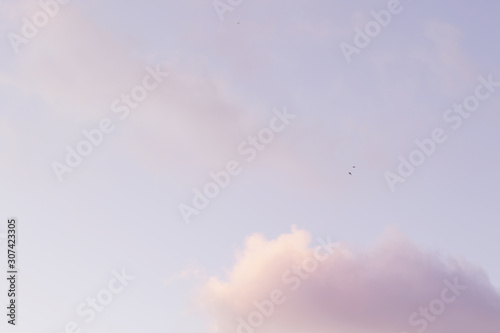 evening cumulus clouds in pastel tones