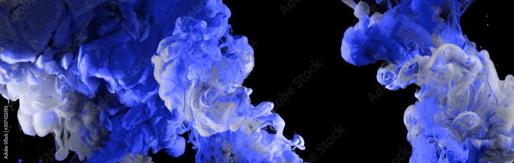 Acrylic blue colors in water. Ink blot. Abstract black background. Acrylic blue colors in water. Ink blot. Abstract black background.