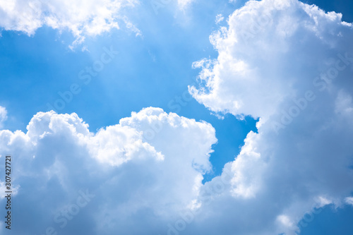Light blue sky with clouds, fresh atmosphere, may be used as background, blue sky background with tiny clouds. panorama