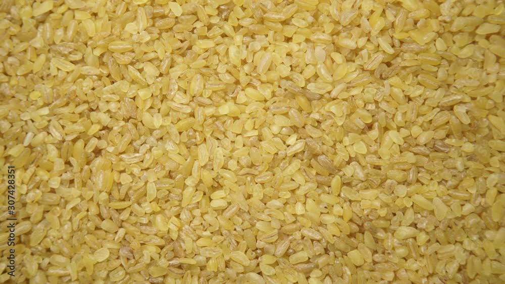 Bulgur wheat cereal food as background. Top view. Healthy diet Bulgur wheat cereal food as background. Top view. Healthy diet