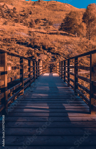 Wooden bridge at Grasmere Lake in the Lake District, Cumbria, UK. 