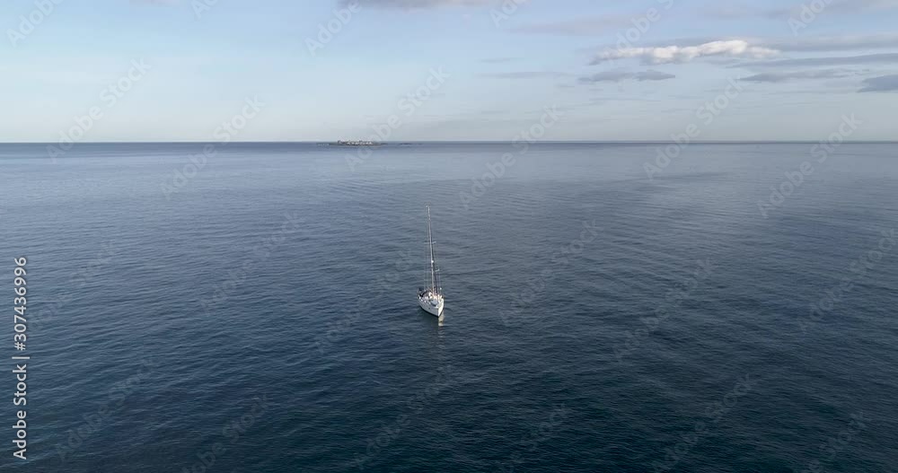 Aerial video with sailboat drone in the Mediterranean with dropped candles at sunset_Spain Aerial video with sailboat drone in the Mediterranean with dropped candles at sunset_Spain