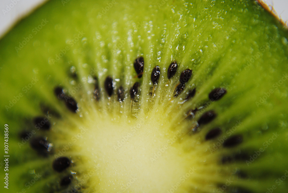 Fresh kiwi on white background, fresh fruit (macro photography) Fresh kiwi on white background, fresh fruit (macro photography)