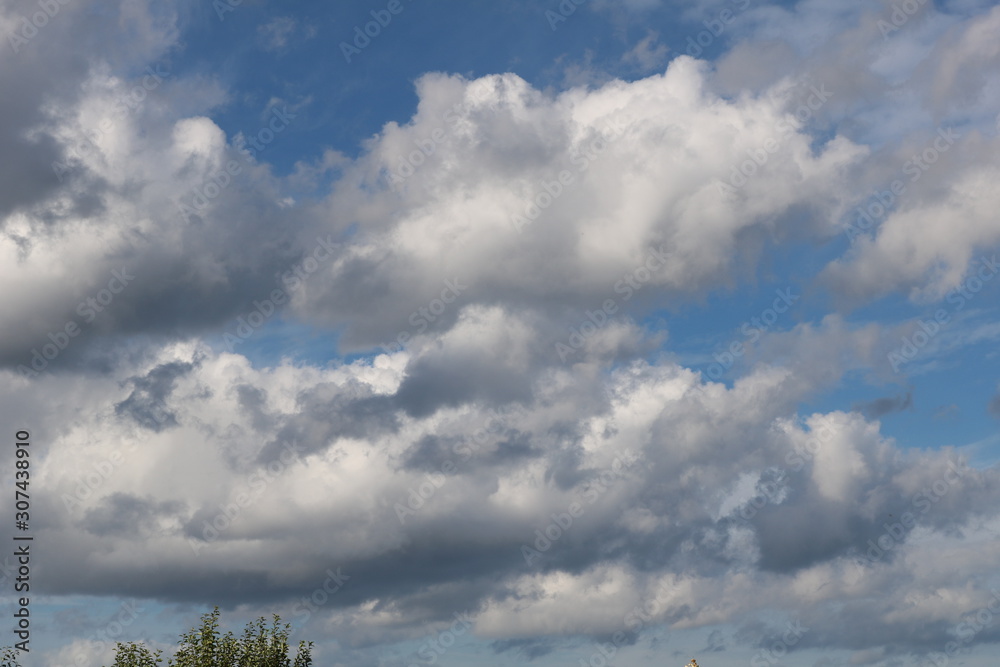 Clouds float across the sky