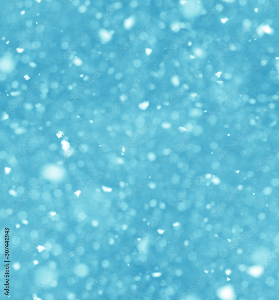 Seamless turquoise texture. Falling snow.