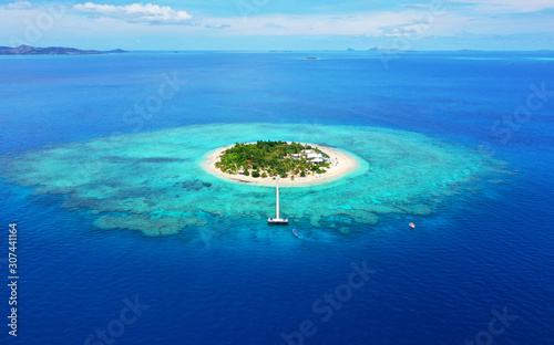 Paradise Island. Aerial View of beautiful Mala Mala Island, Fiji, Pacific Ocean. Drone shot. photo