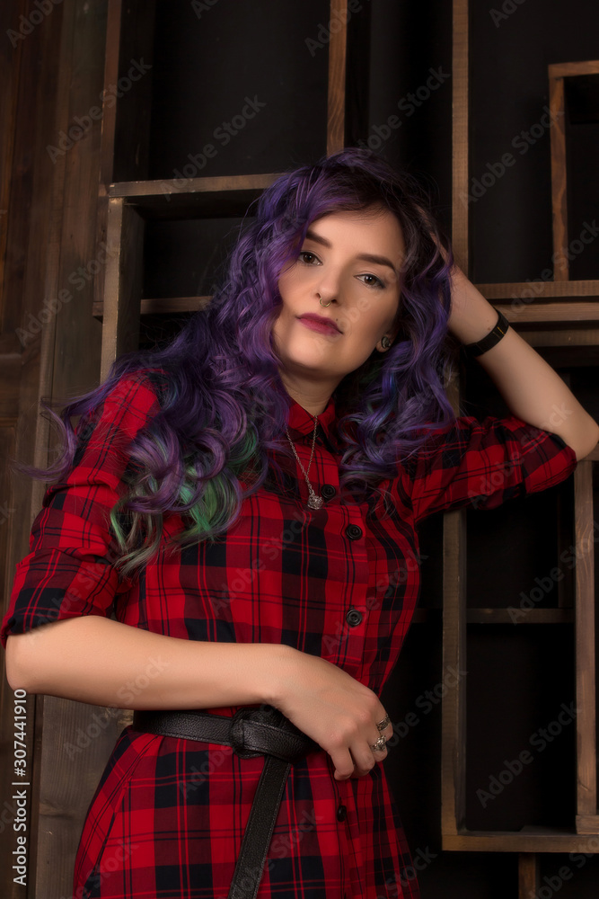 Fototapeta premium portrait of young woman with colored hair