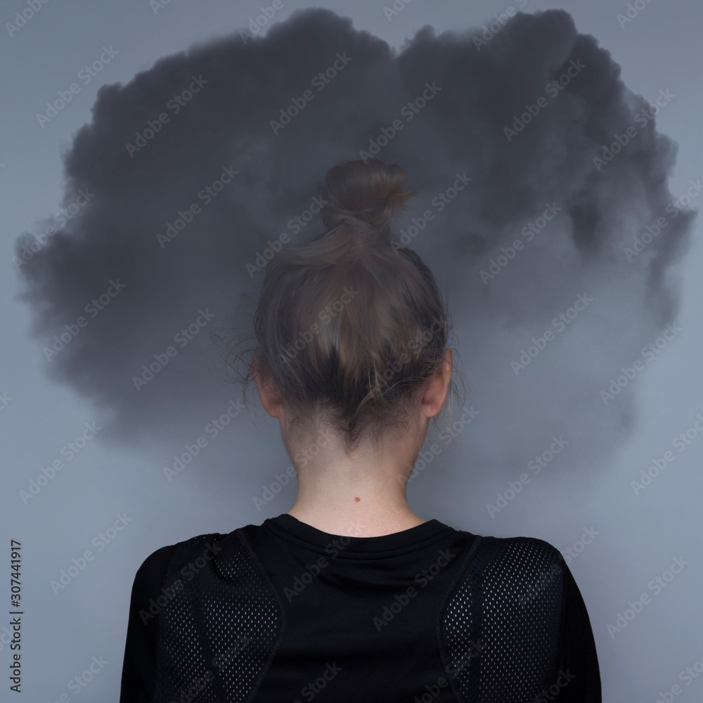 Girl with dark cloud on your head. Mental health care concept. Anxiety problem. Sad expression. Asian woman. Great design for any purposes. Stock photography. Girl with dark cloud on your head. Mental health care concept. Anxiety problem. Sad expression. Asian woman. Great design for any purposes. Stock photography.