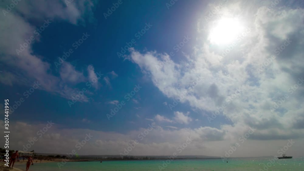 Beach sun and fluffy clouds abstract background timelapse Beach sun and fluffy clouds abstract background timelapse