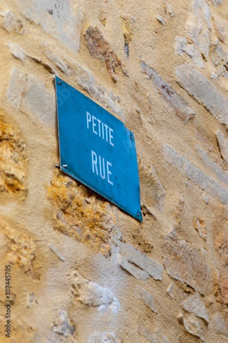 Street name sign in French town: "Small Street" (ID: 307445705)