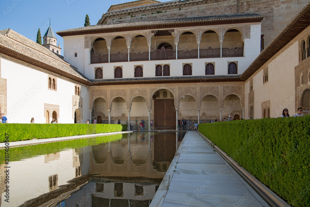 Patio of Nasrid moresque palace of Alhambra. The palace is UNESCO World Heritage and the official number one travel destination of Spain.