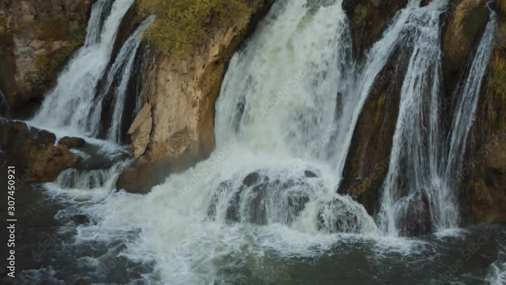 Beautiful falls in the mountain gorge Beautiful falls in the mountain gorge