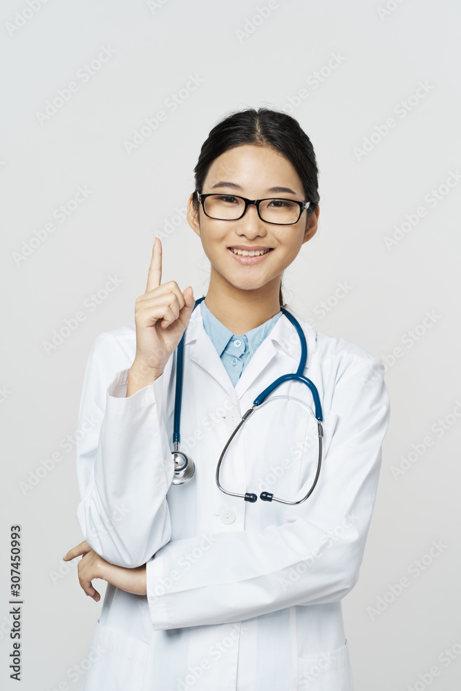 young doctor with stethoscope young doctor with stethoscope