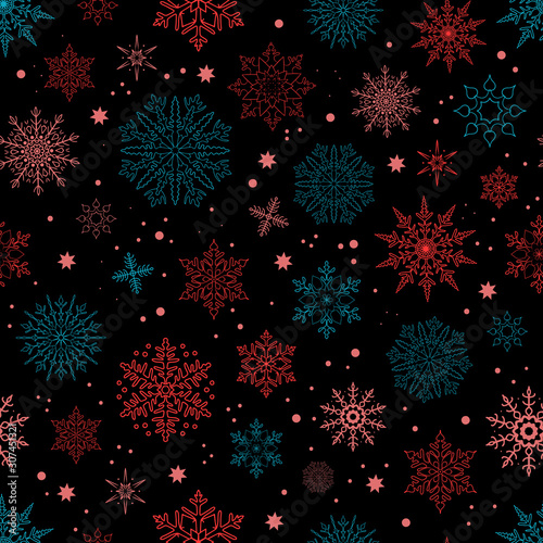 Snowflakes on the dark background. Falling snow. Beautiful ornament. Vector illustration. Golden flakes. Snowballs. Seamless winter pattern, motifs.