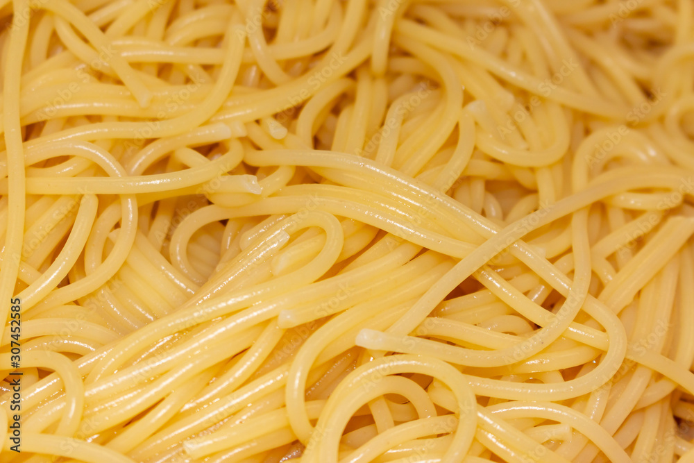 a portion of cooked spaghetti in closeup