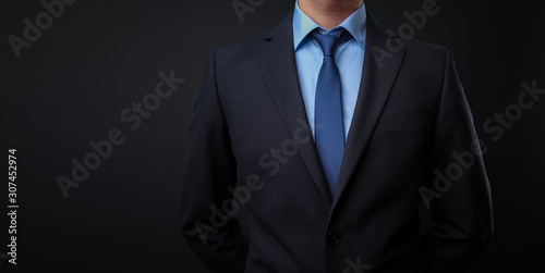 Фотография Man in black blue suit with tie